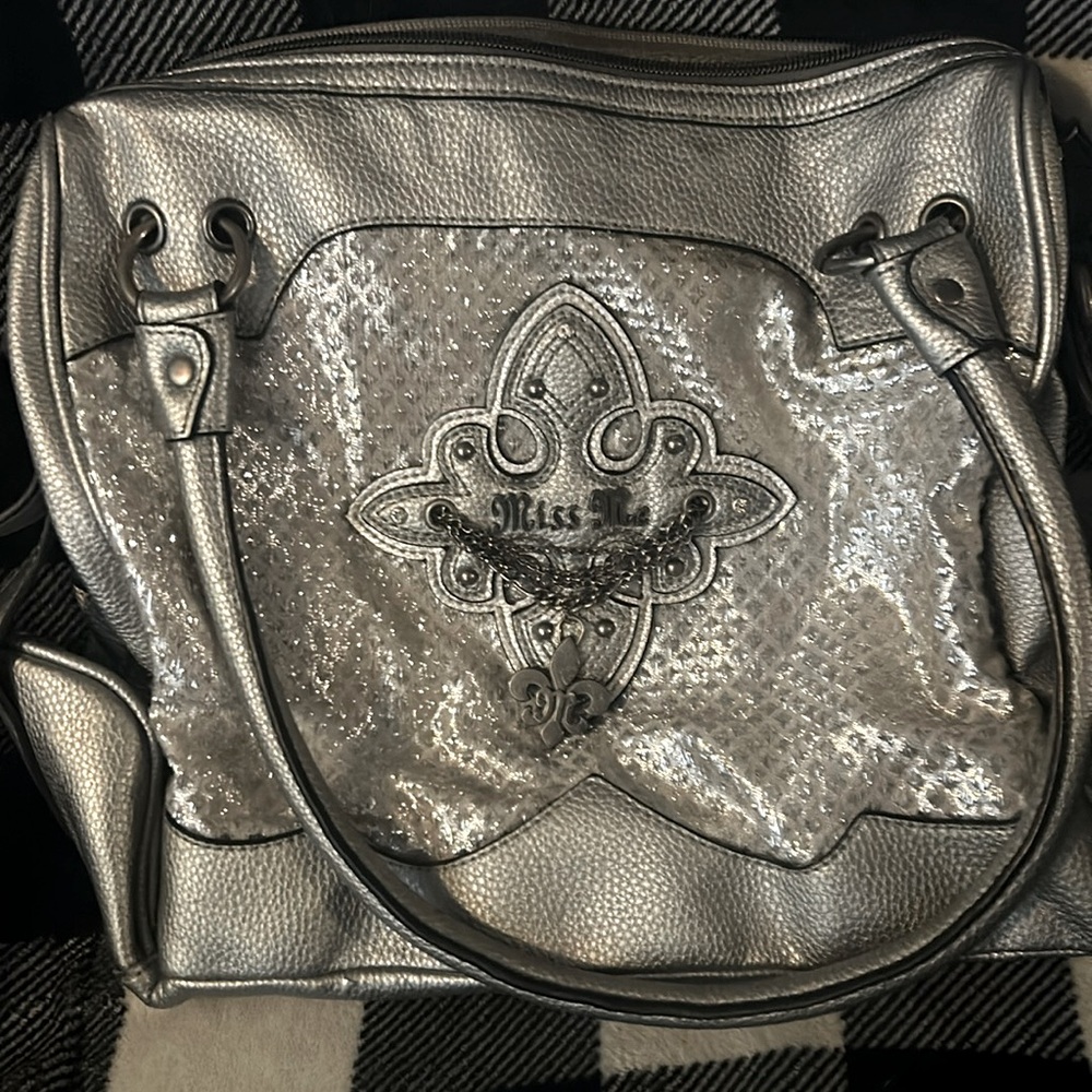 Miss me shoulder bag. Very good condition. A few places on bottom.